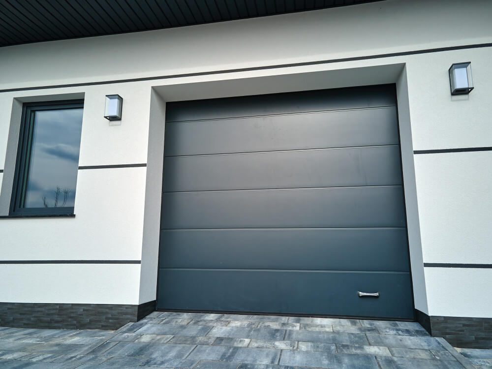 Pourquoi choisir une porte de garage sur mesure pour votre maison?